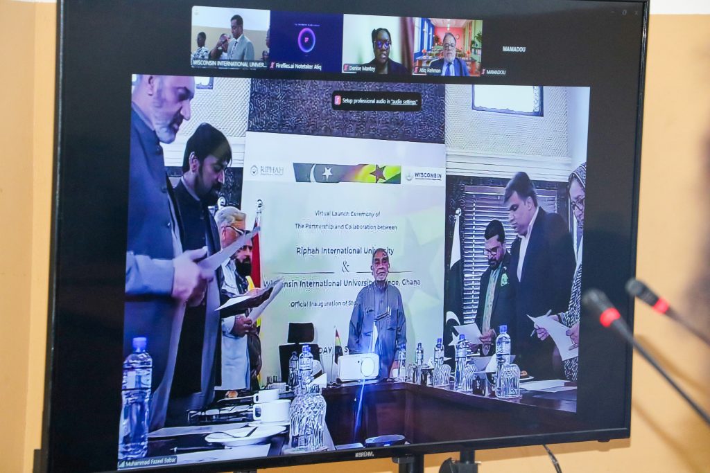 Members of the Riphah International University team in Pakistan participating virtually in the Joint Steering Committee swearing in ceremony.