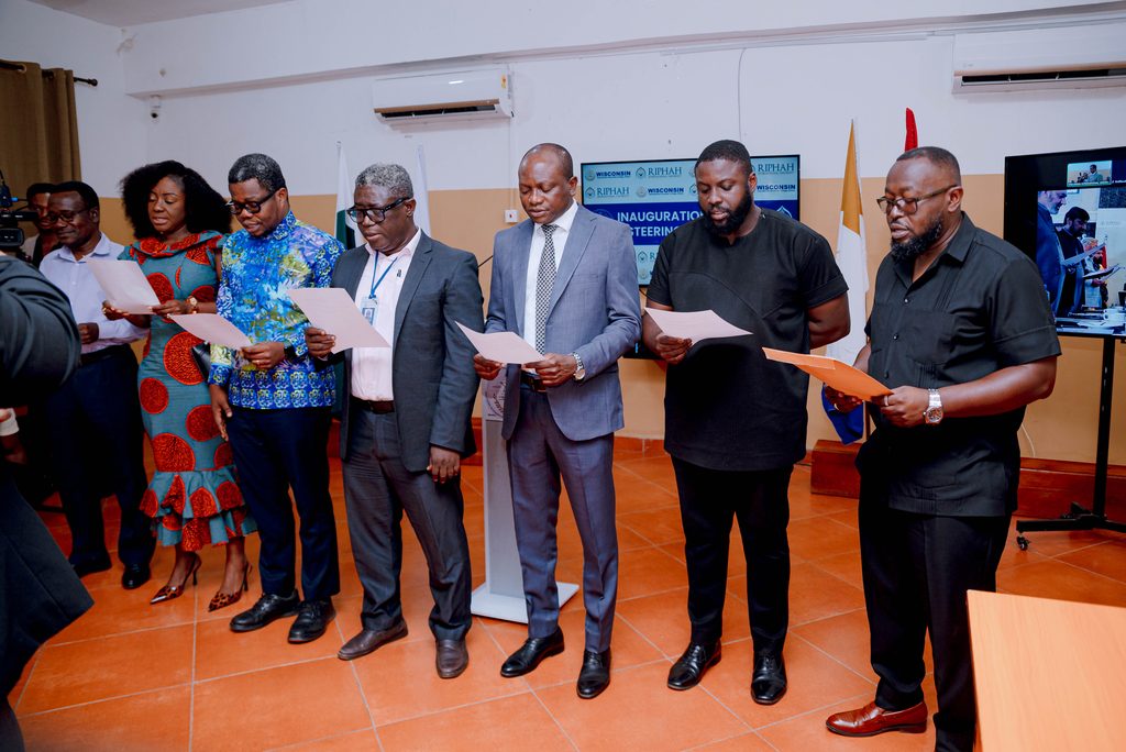 WIUC Ghana Joint Steering Committee members reciting their oath during the formal swearing in ceremony.